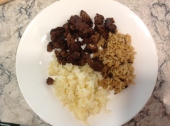 Plate of cauliflower, brown rice and beef tips